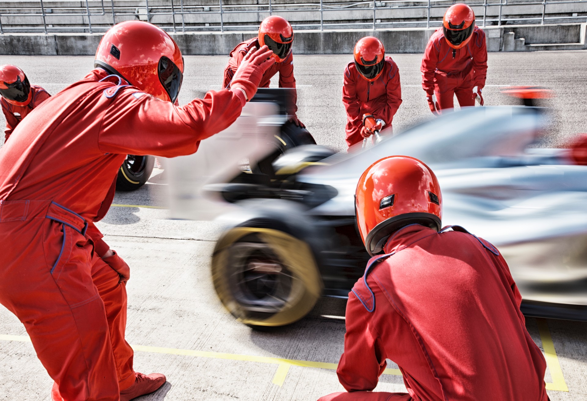 Racing team working at pit stop